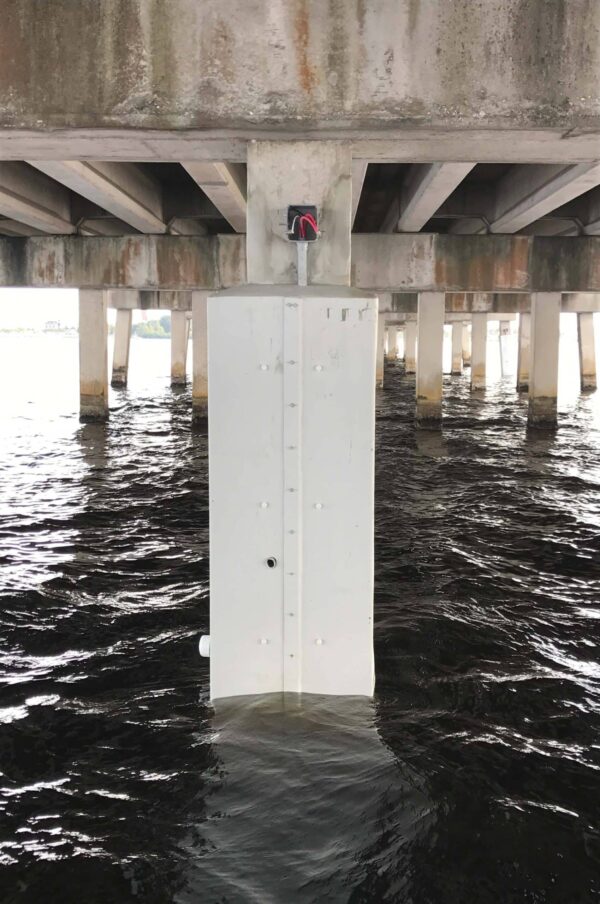 Marine Construction project completed under a bridge | Inland Construction & Engineering, Inc. Panama City, Florida providing construction, general contracting, marine construction, design & engineering, diving services, roofing, & bulding rehab.